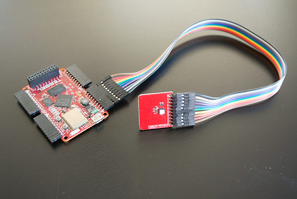 Tessel with weather module attached via jumper wires